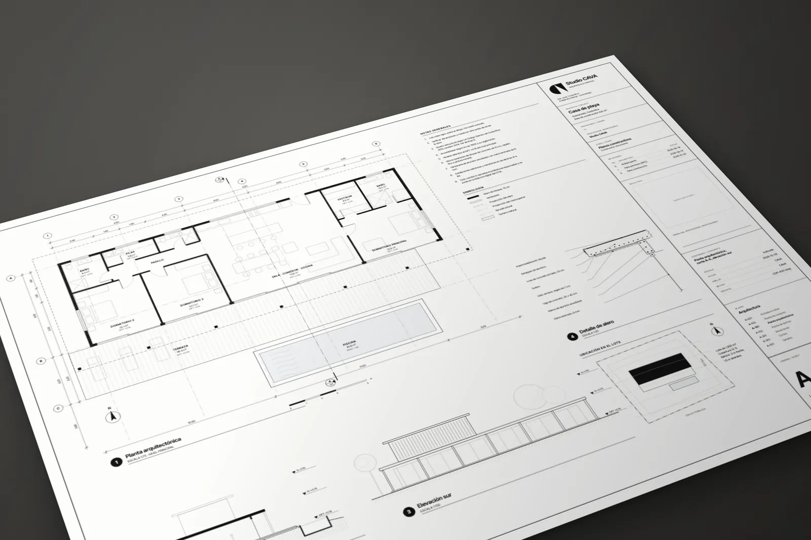 The drawing sheet A-101 lying on a dark table